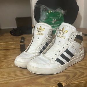slightly used adidas white and gold high tops